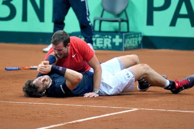Andy Murray celebrates winning his match and winning the Davis Cup at the Flanders Expo, Ghent.
Picture: Jane Barlow