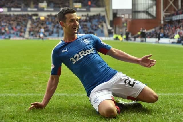 Jason Holt celebrates opening the scoring for Rangers. Picture: SNS Group