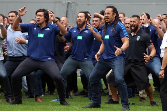 Former players including Tana Umaga (front R) perform a haka during the memorial service for New Zealand All Blacks rugby legend Jonah Lomu. Picture: AFP/Getty