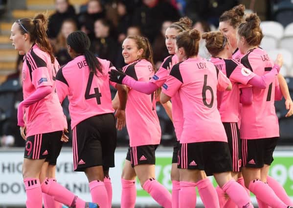 Scotland's Jane Ross (centre) celebrates after opening the scoring. Picture: SNS