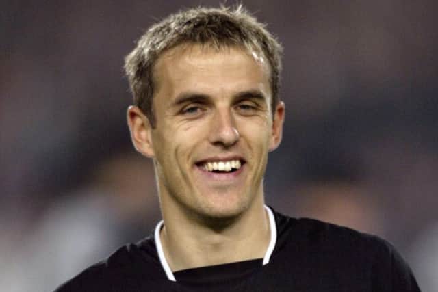 Phil Neville during his Manchester United days. Picture: PA