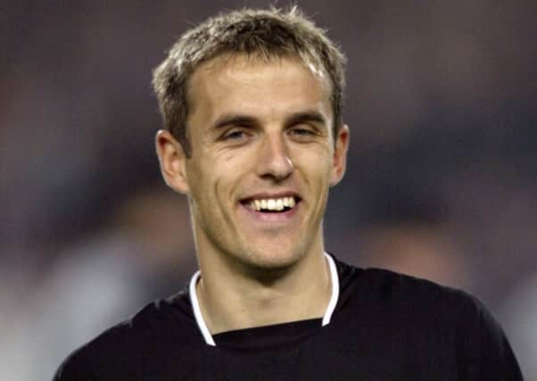 Phil Neville during his Manchester United days. Picture: PA