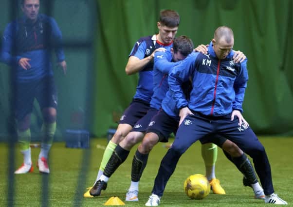 Kenny Miller leads the line during a training routine at Murray Park yesterday. Picture: Kirk O'Rourke