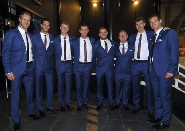 The victorious Great Britain team, Dom Inglot (left), James Ward, Kyle Edmund, Captain Leon Smith, Dan Evans, Matt Little, Jamie Murray and Andy Murray. Picture: Getty Images