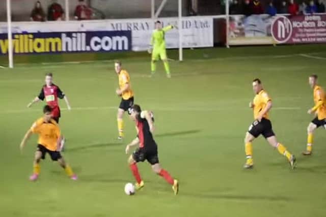 Neil McLean embarks on his equalising run. Picture: YouTube