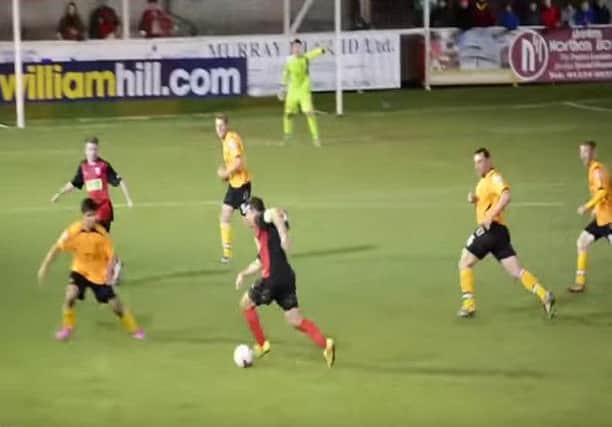 Neil McLean embarks on his equalising run. Picture: YouTube