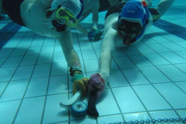 Octopush, or underwater hockey, is played by around 10 clubs across Scotland