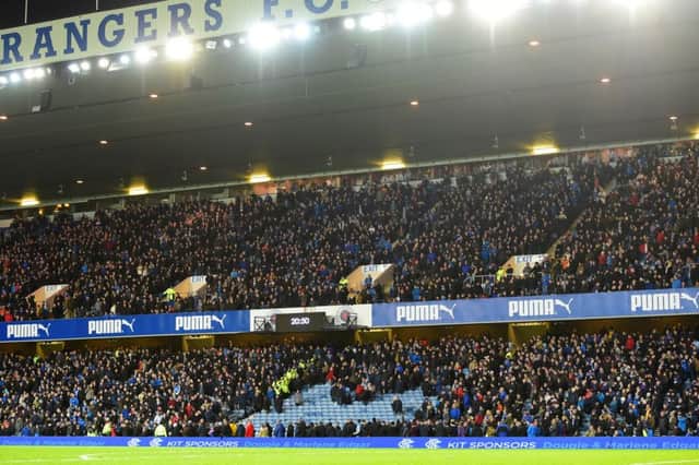 Rangers fans are moved from a section in Ibrox. Picture: SNS