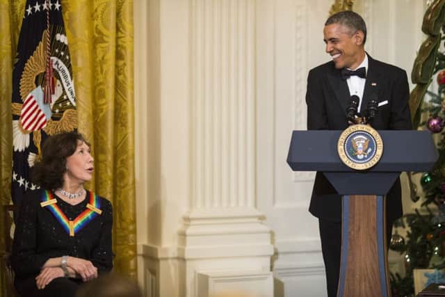 Lily Tomlin with President Barack Obama during the Kennedy Center Honors Reception in the East Room at the White House. Picture: The New York Times