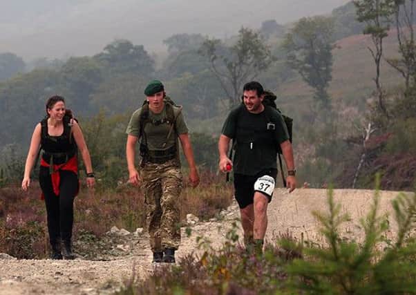 "Survive the Yomp" is a 30-mile trek through the Scottish Highlands supported by Royal Marine Commandos. Photo: Commando Spirit