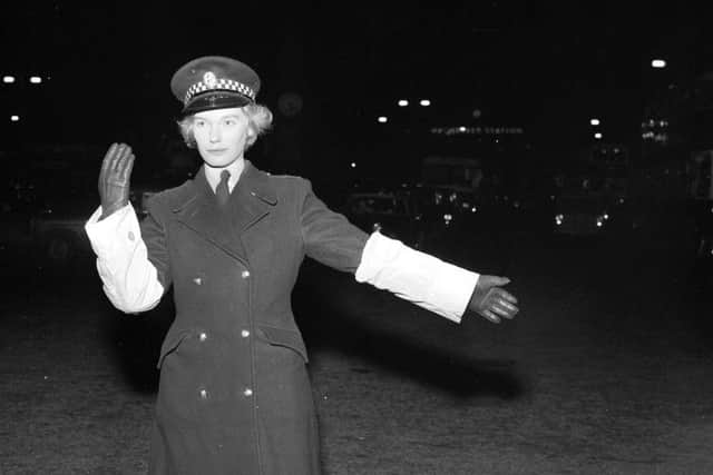 Policewoman Sheila Johnstone on point duty at Haymarket in 1962.
