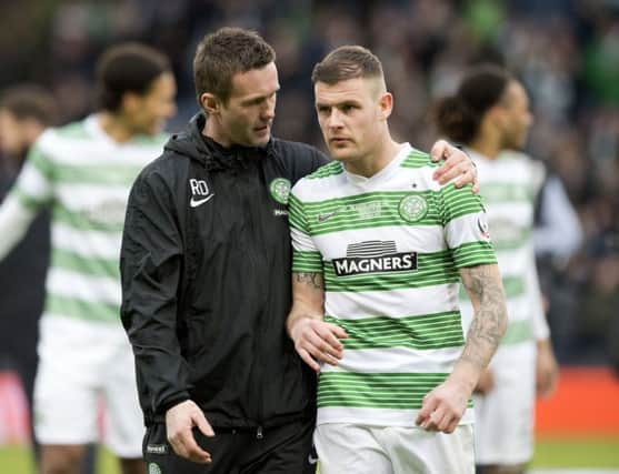 Celtic manager Ronny Deila puts an arm around Anthony Stokes after last seasons League Cup final. Picture: SNS Group