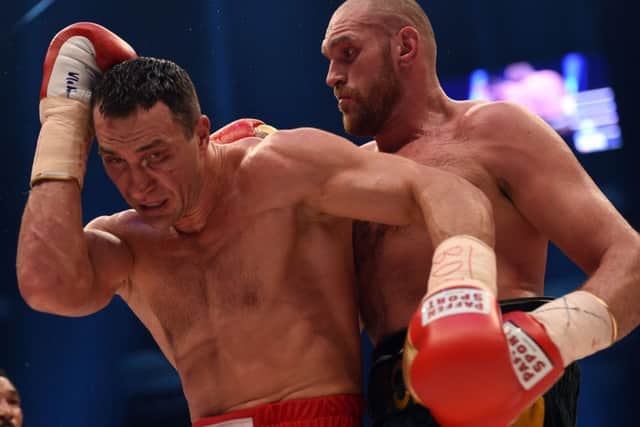 Wladimir Klitschko, left, insists he under-performed in his surprise defeat by Britains Tyson Fury in Germany at the weekend. Picture: AFP/Getty Images