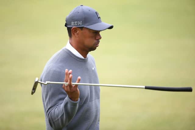 A disgruntled Tiger Woods walks off the 18th green at the Old Course in St Andrews last July. Picture: Getty Images