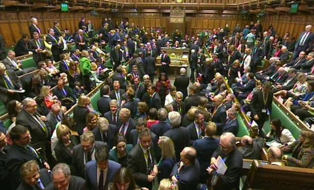 A crowded House of Commons after MPs backed David Cameron's plans 397 to 223. Picture: PA