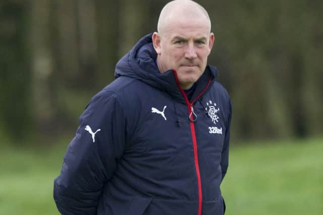 Rangers manager Mark Warburton was constantly quizzed about supposed interest from Fulham. Picture: SNS