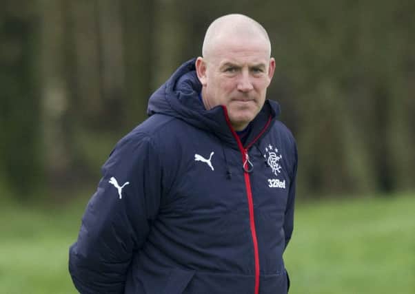 Rangers manager Mark Warburton was constantly quizzed about supposed interest from Fulham. Picture: SNS