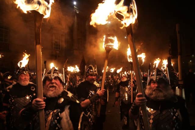 Men dressed as Vikings during the Hogmanay Torchlight Procession in Edinburgh. Picture: PA