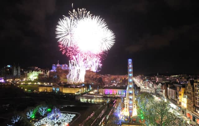 Fireworks above Edinburgh Castle and Princes Street at the bells. Picture: Jane Barlow