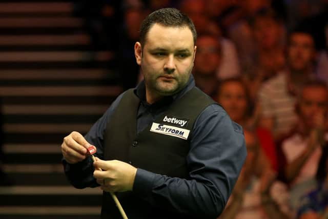 Stephen Maguire in action against Neil Robertson. Picture: PA