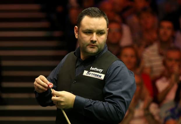 Stephen Maguire in action against Neil Robertson. Picture: PA