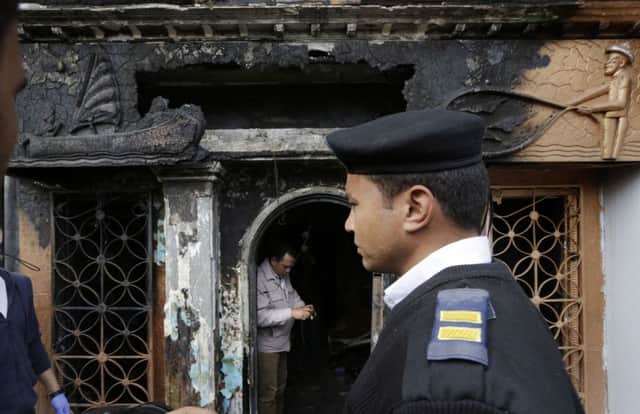 A policeman stands in front of the El Sayad nightclub and restaurant after the attack. Picture: AP