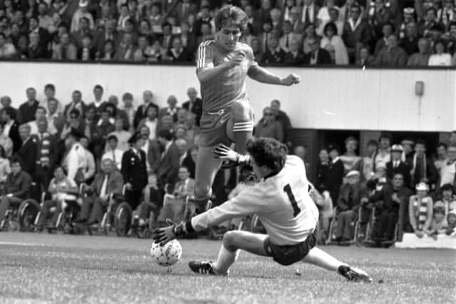 Pat Bonner snatches the ball fromMark McGhee during the Aberdeen v Celtic Scottish Cup final in May 1984. The Dons won 2-1. Picture: Brian Stewart
