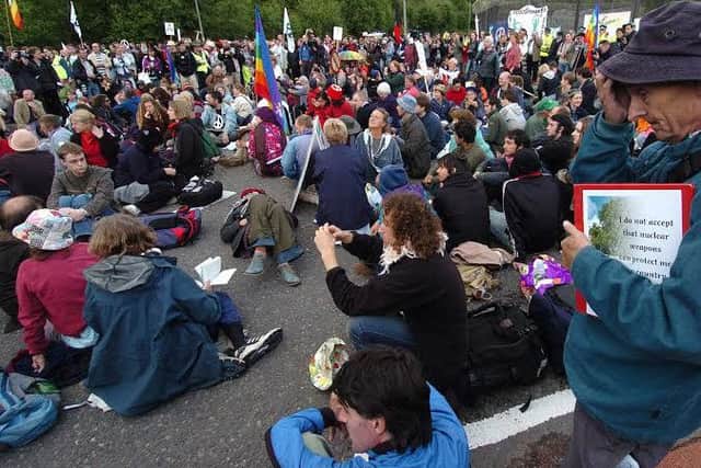Hundreds of protestors gathered at Faslane Nuclear Submarine base in the first of many protests during the duration of the G8 summit at Gleneagles.  Picture Stephen Mansfield    4th July 2005