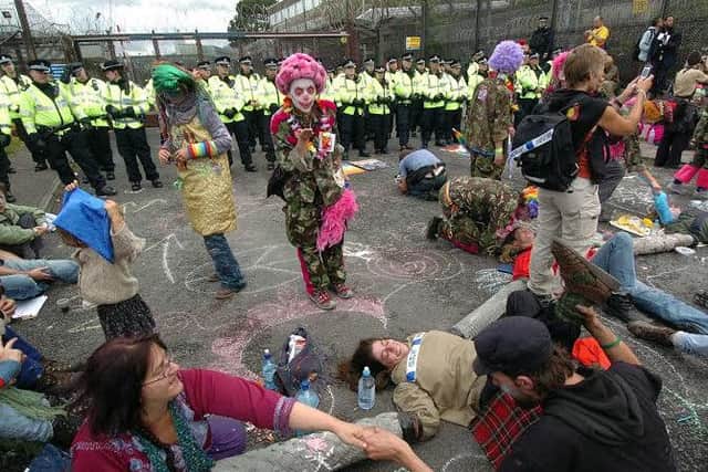 Hundreds of protestors gathered at Faslane Nuclear Submarine base in the first of many protests during the duration of the G8 summit at Gleneagles.

Picture Stephen Mansfield    4th July 2005