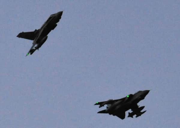 RAF Tornado GR4's fly over RAF Akrotiri in Cypru. Picture: PA