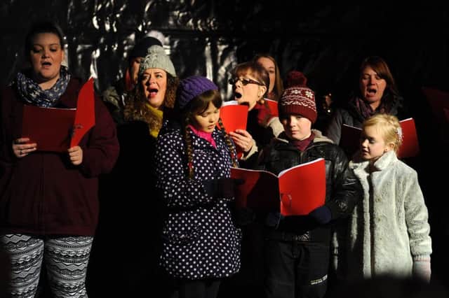 Singing carols was a habit 31 per cent thought was worth maintaining. Picture: Walter Neilson