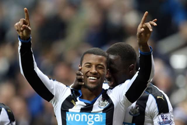 Georginio Wijnaldum celebrates scoring his side's second goal. Picture: PA