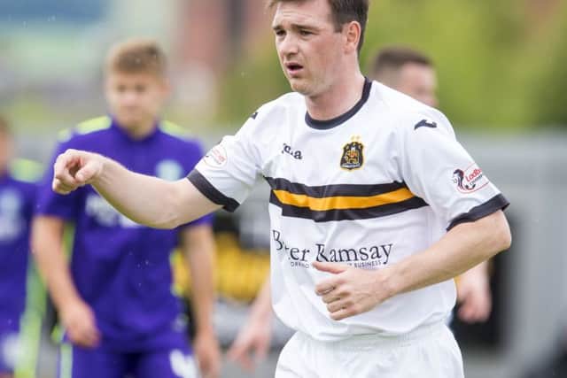 Torrential rain and strong winds at the Indodrill Stadium made playing conditions difficult but Dumbarton adapted better than Alloa and ended a six-game winless run. Picture: SNS