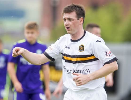 Torrential rain and strong winds at the Indodrill Stadium made playing conditions difficult but Dumbarton adapted better than Alloa and ended a six-game winless run. Picture: SNS