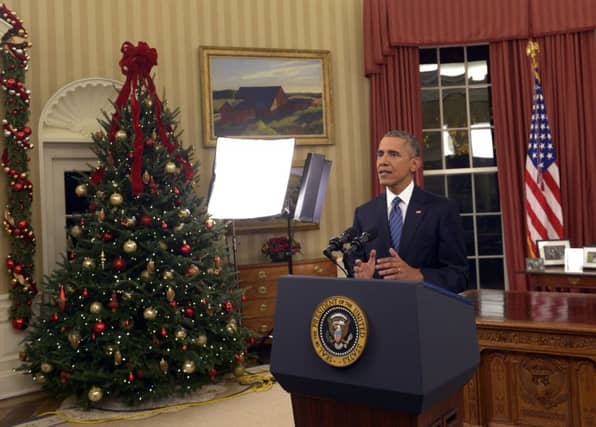 President Barack Obama addresses the nation from the Oval Office at the White House in Washington. Picture: AP