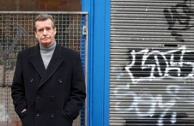 William McIlvanney outside the public library in Sinclair Street, Glasgow. Picture: Robert Perry