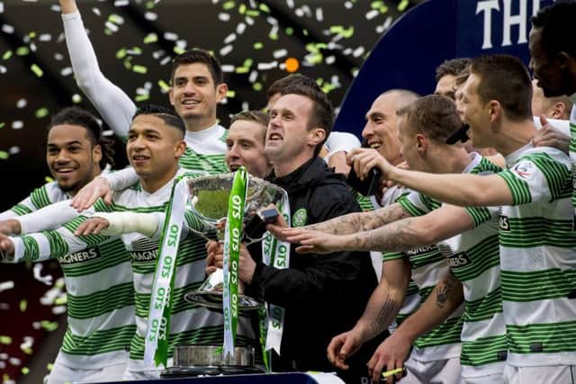 Celtic celebrate winning the 2015 Scottish League Cup after defeating Dundee United 2-0 at Hampden. Picture: SNS
