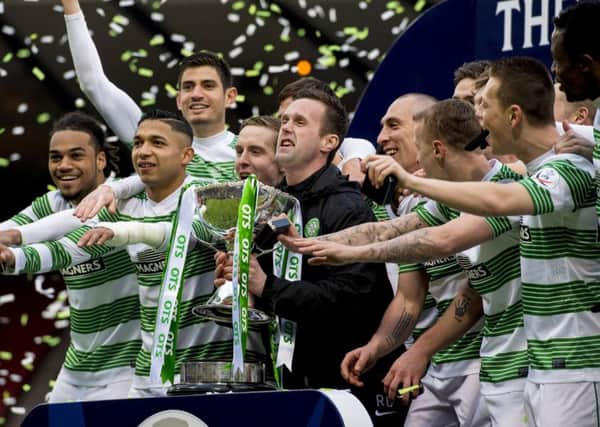 Celtic celebrate winning the 2015 Scottish League Cup after defeating Dundee United 2-0 at Hampden. Picture: SNS