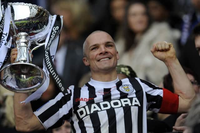 St Mirren capitain Jim Goodwin lifts the Scottish League Cup after the Buddies defeated Hearts 3-2 in the 2013 final. Picture: Phil Wilkinson