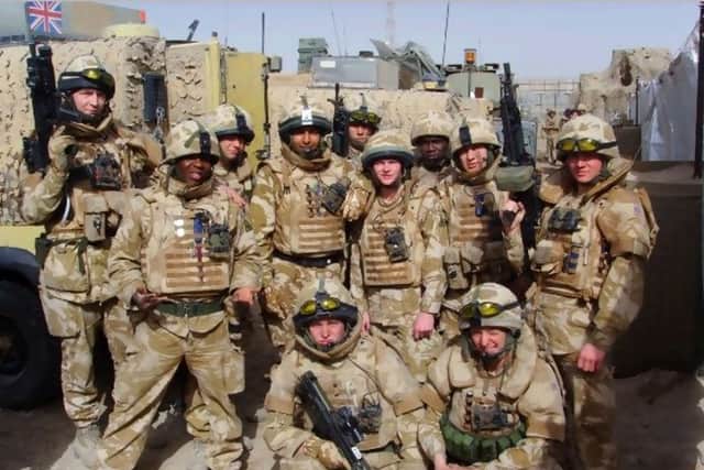 Chris Herbert pictured during a tour of duty in Iraq (front, centre). Picture: Facebook/Chris Herbert