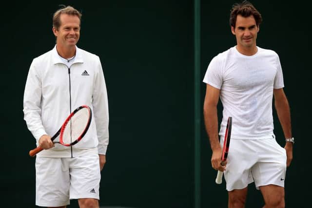 Roger Federer (right) has split from his coach Stefan Edberg. Picture: Mike Egerton/PA Wire