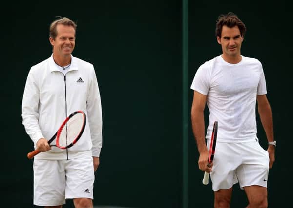 Roger Federer (right) has split from his coach Stefan Edberg. Picture: Mike Egerton/PA Wire