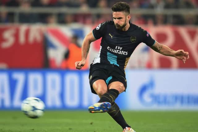 Arsenals Olivier Giroud completes his hat-trick from the penalty spot  last night. Picture: Getty Images