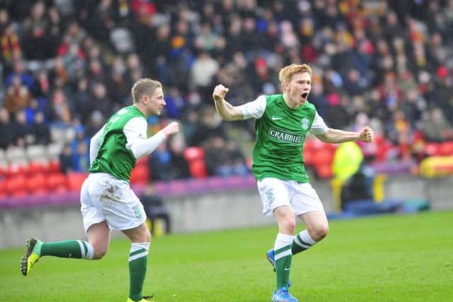Duncan Watmore celebrates his goal for Hibs against Partick Thistle in March 2014.  Picture: Robert Perry