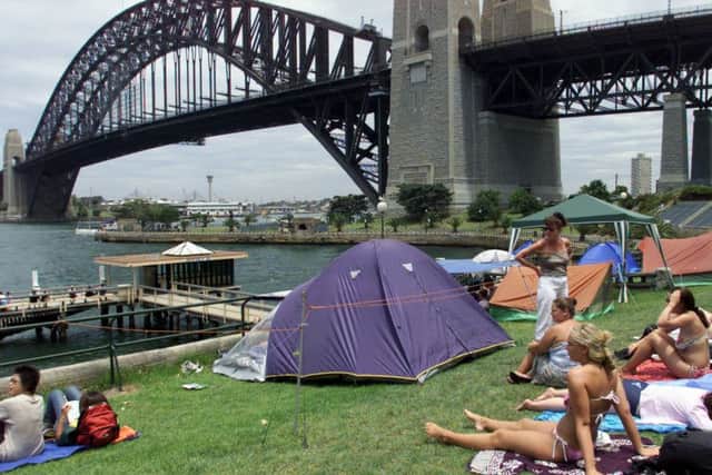 Sydney siders take up their vantage points under the Sydney Harbour Bridge - did they know a Scot helped design it?