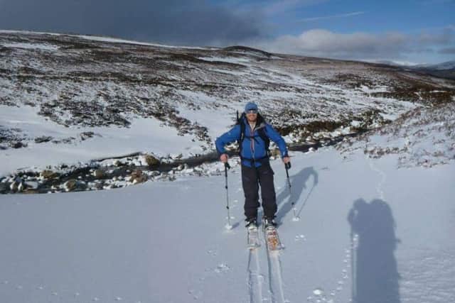 Craig Burry treks out over to the west of Lochnagar in the Invercauld area. Picture: Andy Thomson