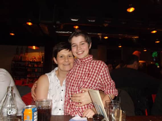 Arran with mum Alison. The 13-year-old passed away in 2014 after being diagnosed with a brain tumour. His family are now fundraising in his name