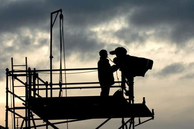 A cameraman at New Douglas Park for a match between Hamilton and Celtic. Picture: Neil Hanna