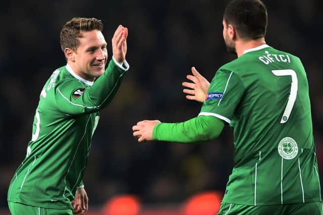 Celtic substitute Kris Commons celebrates his equaliser with Nadir Ciftci in Istanbul. Picture: AFP/Getty Images