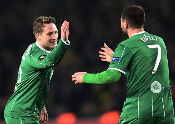 Celtic substitute Kris Commons celebrates his equaliser with Nadir Ciftci in Istanbul. Picture: AFP/Getty Images